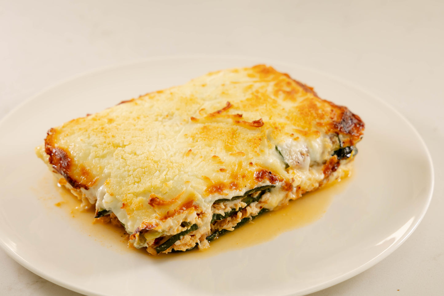 Lasagna de Pollo calabacin, ricotta y espinaca.